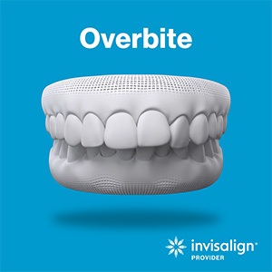 dental hygienist holding two clear aligners in the shape of a heart