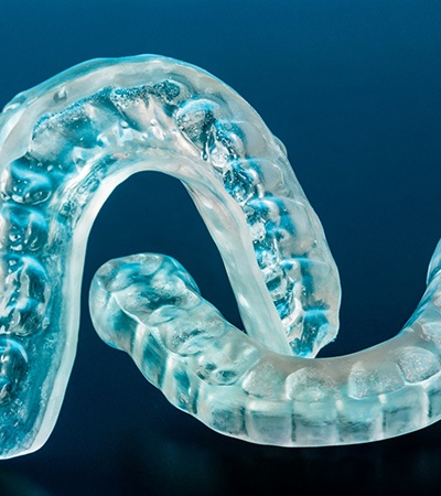 Close-up of two personalized nightguards for bruxism in Sugarcreek Township, OH