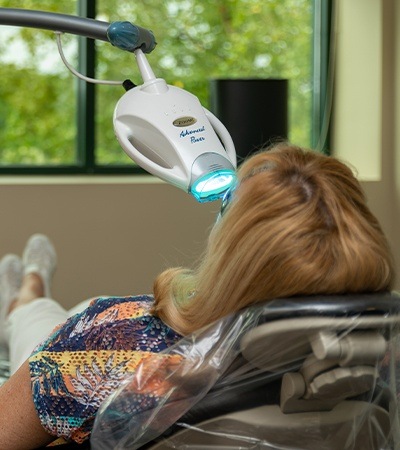 Patient receiving in practice teeth whitening