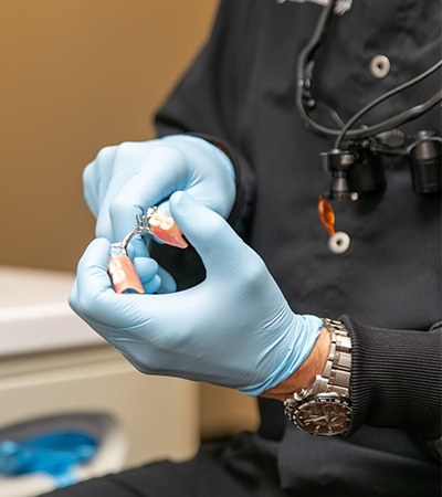 Denture being crafted in dental office