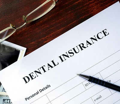 dental insurance form on table