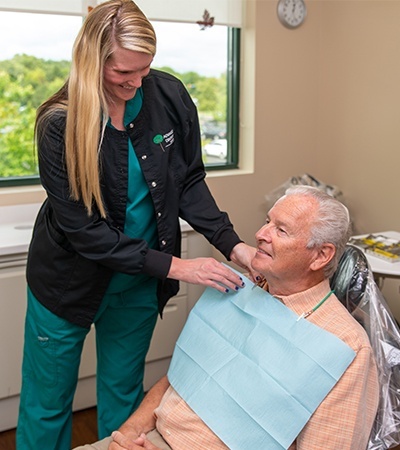 Patient receiving oral cancer screening