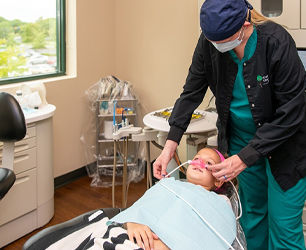 Dental patient receiving sedation dentistry treatment